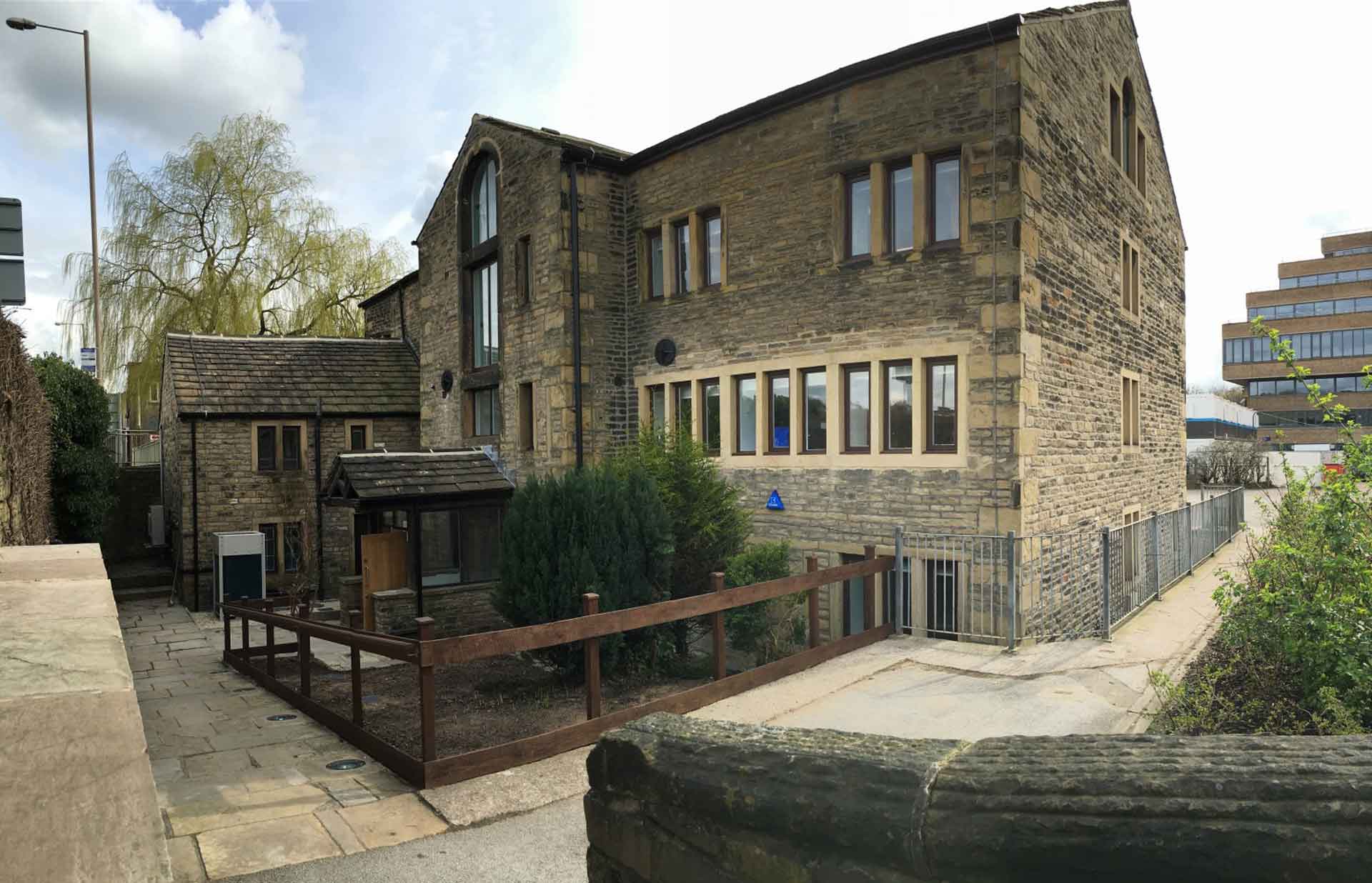 A photo of the entrance of the Sir John Ramsden court building