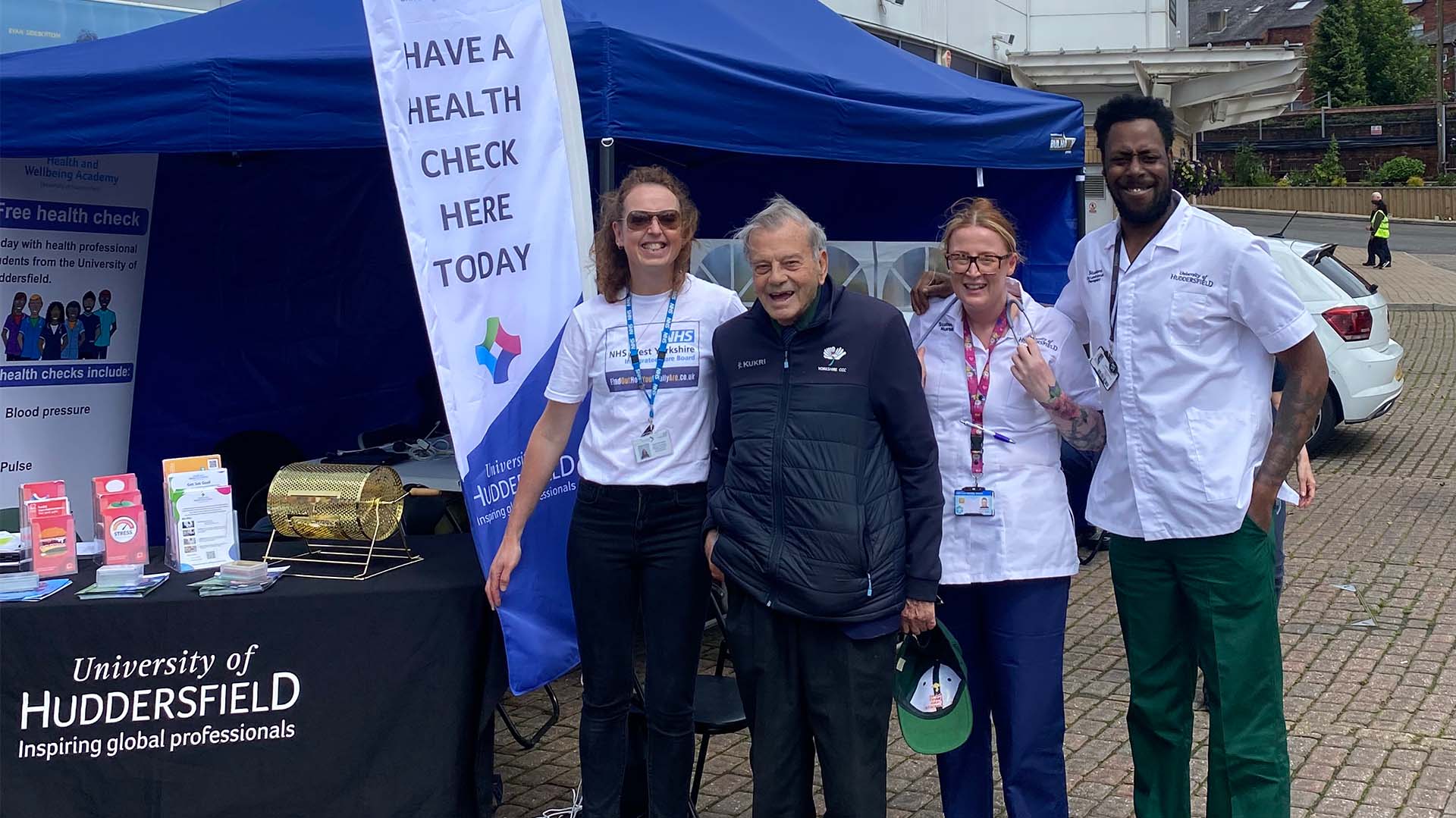 Staf and students with Dickie Bird at Headingley