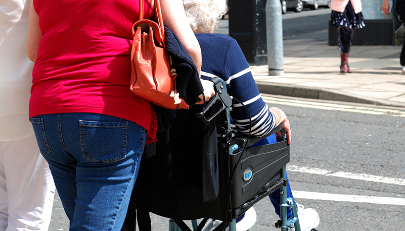Elderly person in wheelchair